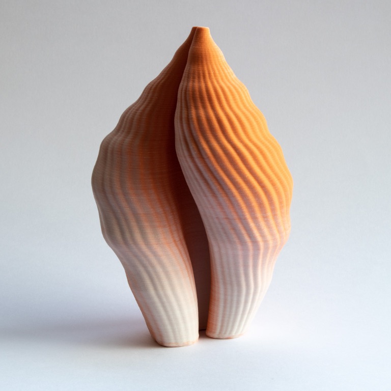 Spiral shell, orange/white porcelain